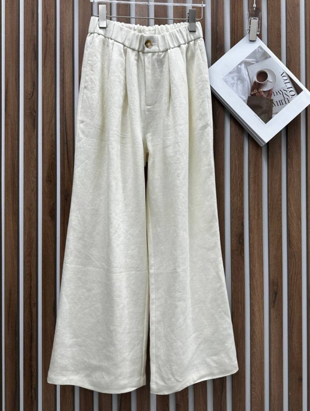 БРЮКИ THE ROW фото