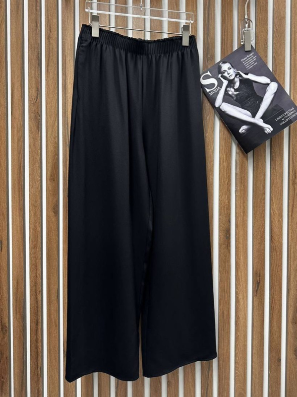 БРЮКИ THE ROW фото