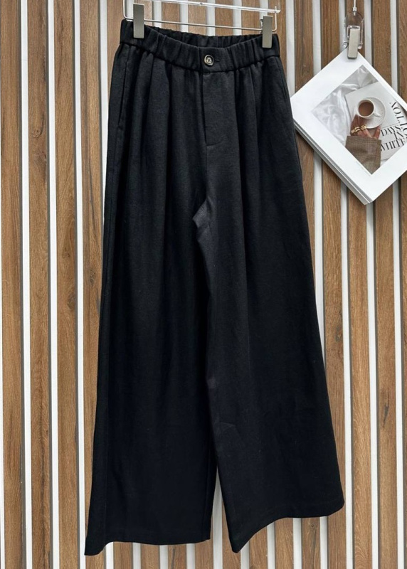 БРЮКИ THE ROW фото