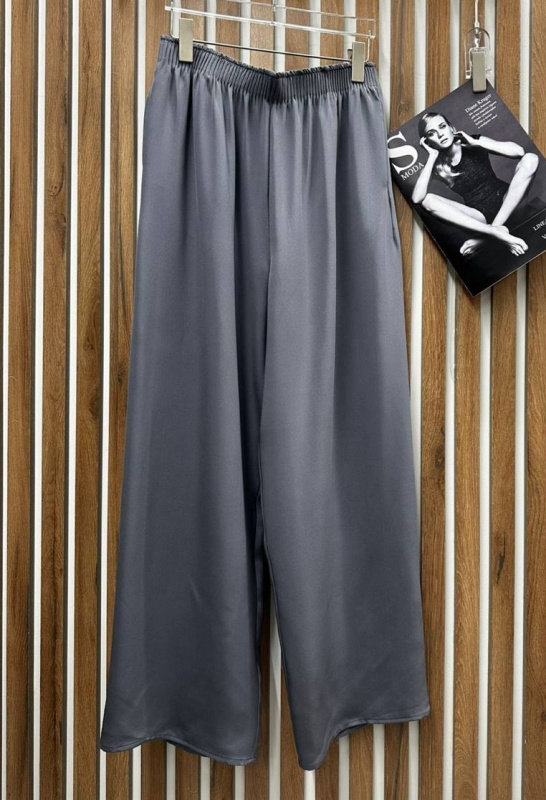 БРЮКИ THE ROW фото